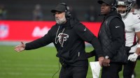 Atlanta Falcons defensive coordinator Jeff Ulbrich (left) and head coach Raheem Morris in the second half against the Atlanta Falcons during the NFL Berlin Game at Olympic Stadium
