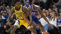 Indiana Pacers guard Quenton Jackson (29) and Philadelphia 76ers guard Vj Edgecombe (77) battle for the ball during the second quarter at Xfinity Mobile Arena. Mandatory Credit: Eric Hartline-Imagn Images
