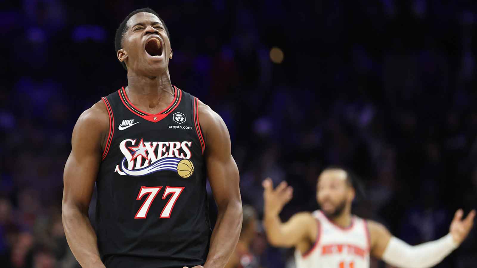 Philadelphia 76ers guard Vj Edgecombe (77) reacts after a play against the New York Knicks that would be eventually overturned during the fourth quarter at Xfinity Mobile Arena.