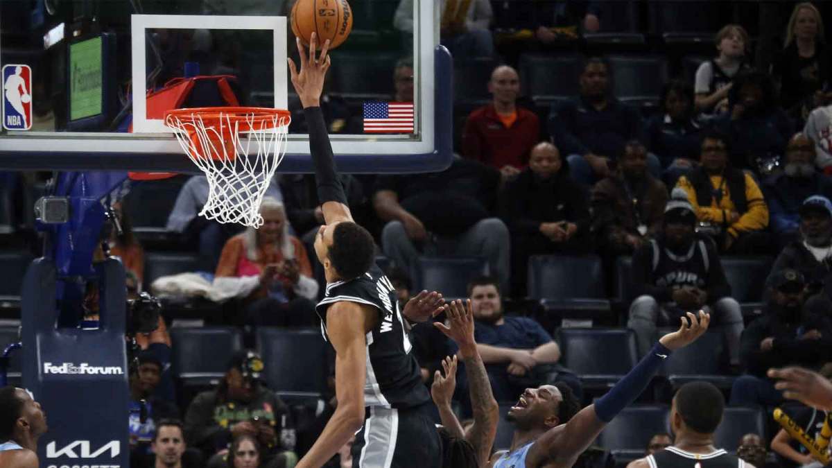 San Antonio Spurs forward Victor Wembanyama (1) blocks a shot attempt by Memphis Grizzlies forward/center Jaren Jackson Jr. (8) during the second quarter at FedExForum.