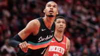 San Antonio Spurs forward Victor Wembanyama (1) boxes Houston Rockets forward Jabari Smith Jr. (10) out after a Rockets free-throw in the second quarter at Toyota Center.