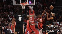 San Antonio Spurs forward Victor Wembanyama (1) shoots against Houston Rockets forward Kevin Durant (7) in the first quarter at Toyota Center.