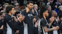 San Antonio Spurs forward Victor Wembanyama (1) celebrates in the second half against the New York Knicks at Frost Bank Center.