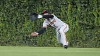 San Francisco Giants center fielder Wade Meckler (53) makes a catch on Chicago Cubs shortstop Dansby Swanson (not pictured) during the first inning at Wrigley Field.