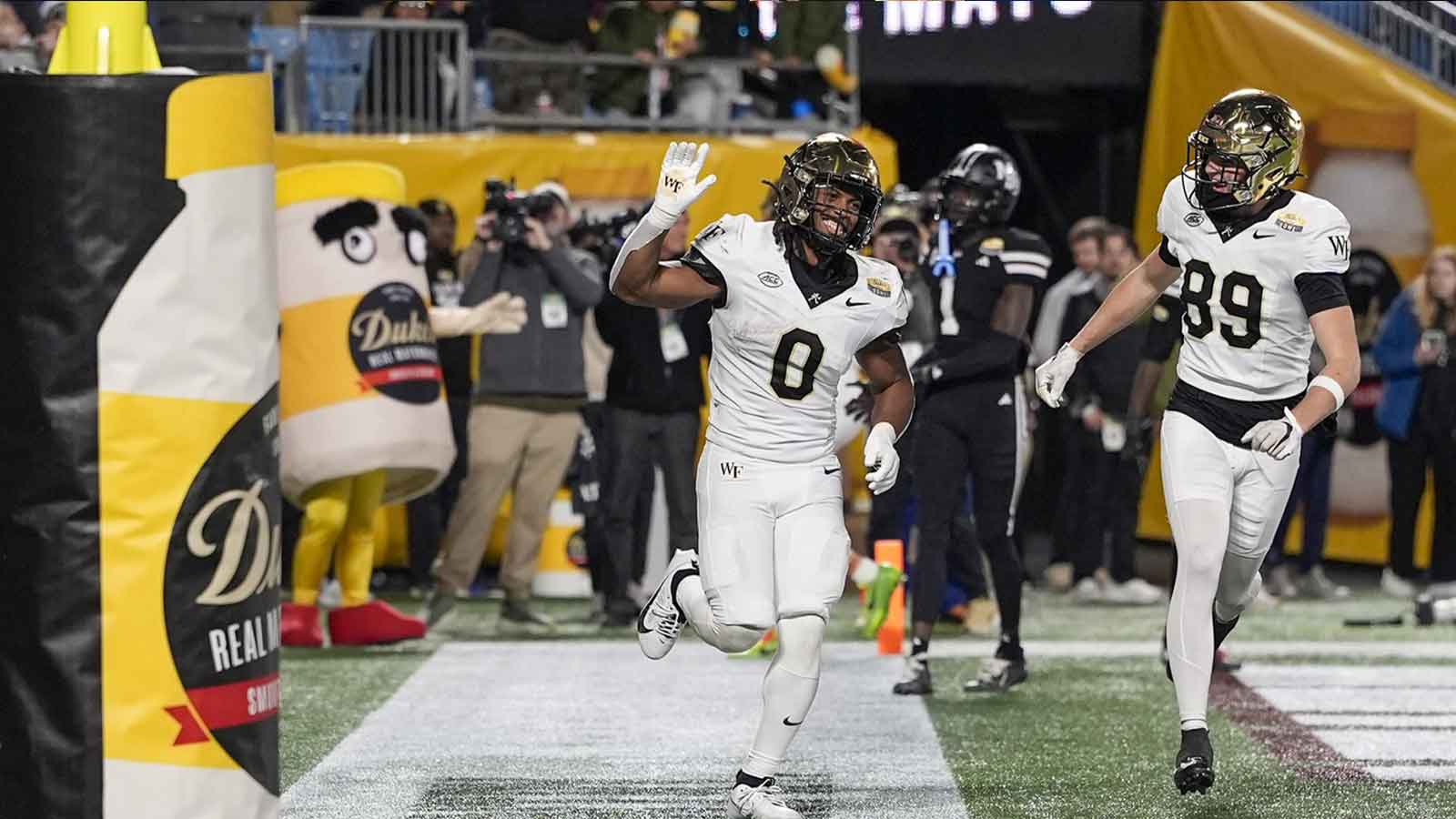 Wake Forest football’s Ty Clark III waves goodbye to the Mississippi State at Duke’s Mayo Bowl