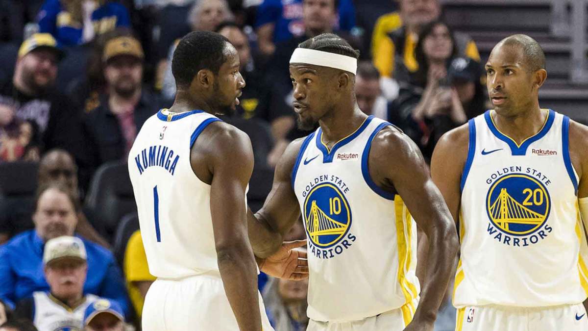 Warriors forward Jimmy Butler III (10) reacts towards forward Jonathan Kuminga (1) during the second quarter against the Portland Trail Blazers at Chase Center