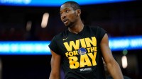 Golden State Warriors forward Jonathan Kuminga (00) stands on the court during warmups against the Minnesota Timberwolves during game four of the second round for the 2025 NBA Playoffs at Chase Center.