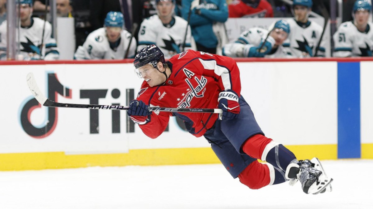 Washington Capitals defenseman John Carlson (74) shoots the puck against the San Jose Sharks during the third period at Capital One Arena.