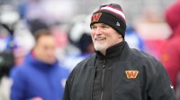Washington Commanders head coach Dan Quinn looks on during warms up prior to the game against the New York Giants at MetLife Stadium.