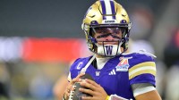 Washington Huskies quarterback Demond Williams Jr. (2) warms up prior to the LA Bowl Game against the Boise State Broncos at SoFi Stadium.