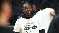 Portland Trail Blazers guard Jrue Holiday (5) smiles during warm ups before playing against the Atlanta Hawks at Moda Center.