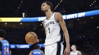 San Antonio Spurs forward/center Victor Wembanyama (1) walks off the court during a time out against the Oklahoma City Thunder during the second half at Paycom Center