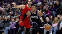 Sacramento Kings guard Russel Westbrook (18) drives around Portland Trail Blazers forward Deni Avdija (8) during the fourth quarter at Golden 1 Center.