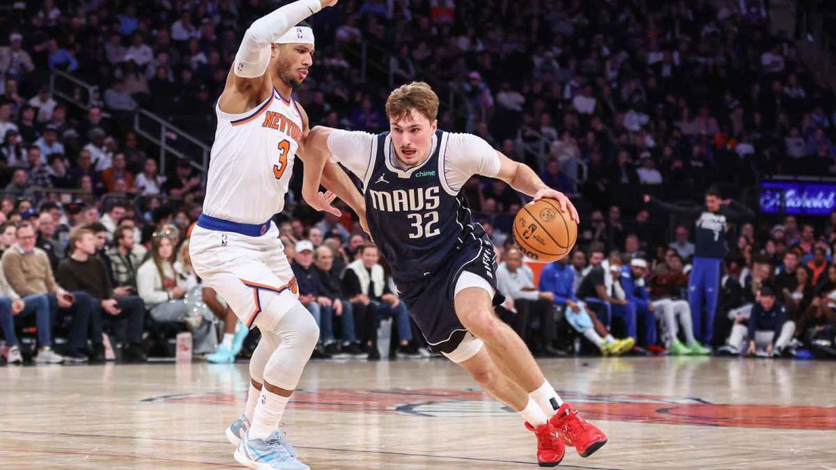 Dallas Mavericks forward Cooper Flagg (32) drives against New York Knicks guard Josh Hart (3) during the fourth quarter at Madison Square Garden.