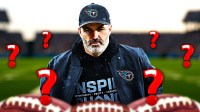 Former Cleveland Browns head coach Kevin Stefanski wearing a Tennessee Titans hat. He is surrounded by question mark emojis.