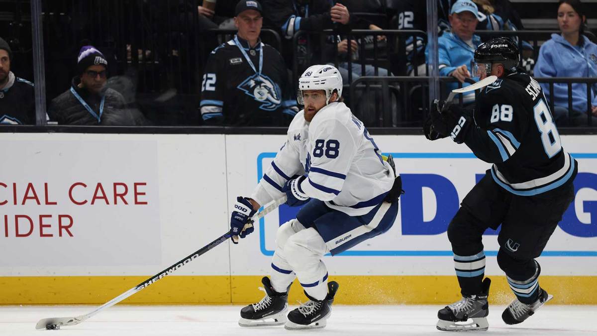 Toronto Maple Leafs right wing William Nylander (88) skates with the puck against Utah Mammoth defenseman Nate Schmidt (88) during the third period at Delta Center.