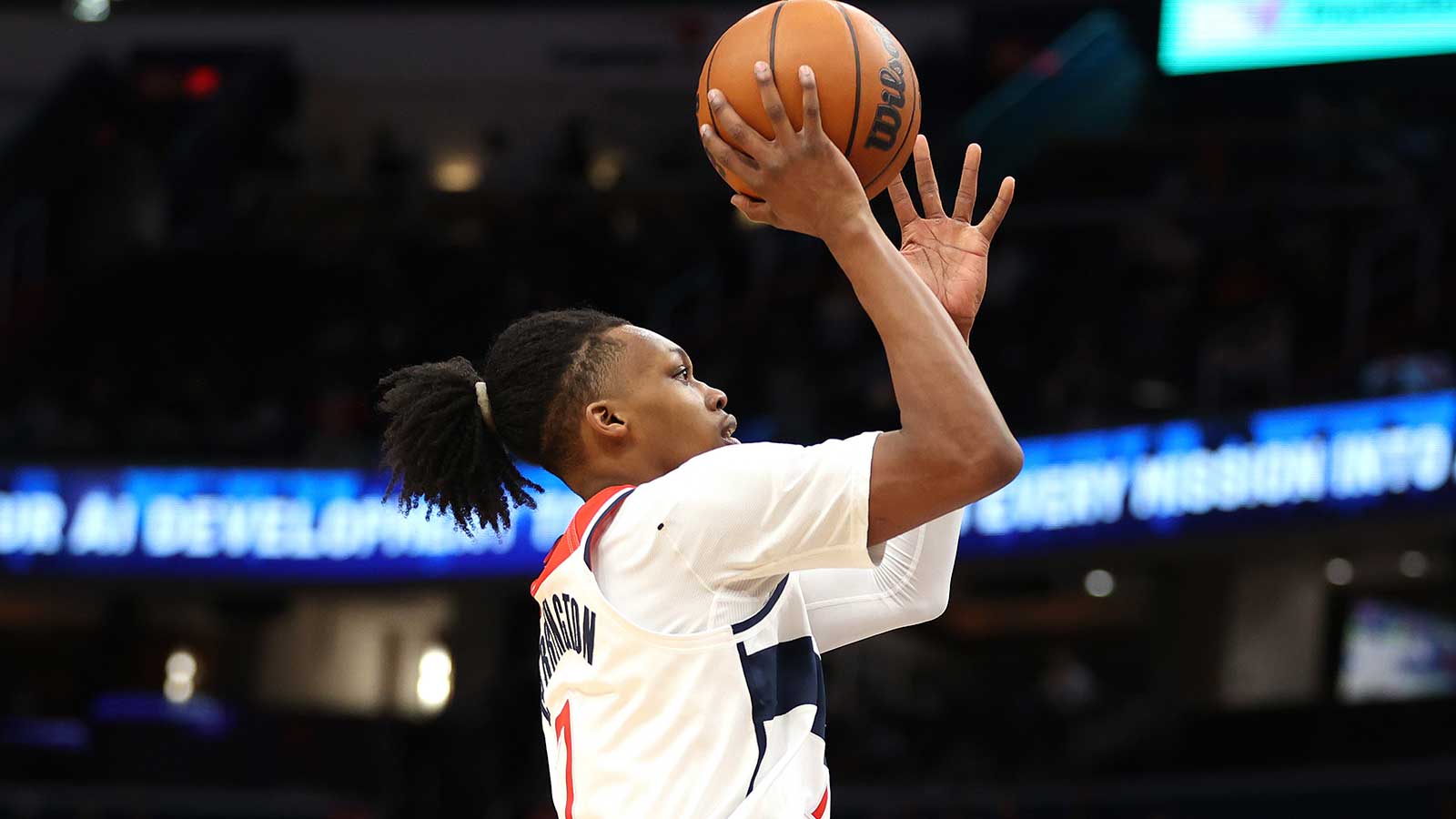 Washington Wizards guard Bub Carrington (7) takes a shot during the second half against the Portland Trail Blazers at Capital One Arena.