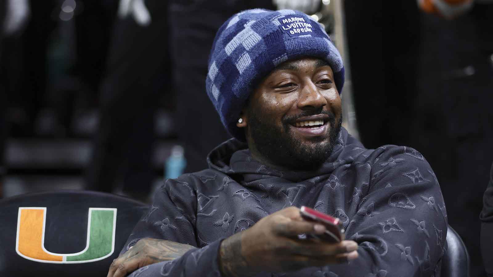 John Wall attends the game between the Pittsburgh Panthers and the Miami Hurricanes at Watsco Center