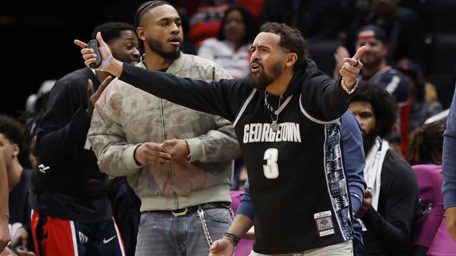 Washington Wizards guard Trae Young gestures from he bench against the LA Clippers in the first half at Capital One Arena.
