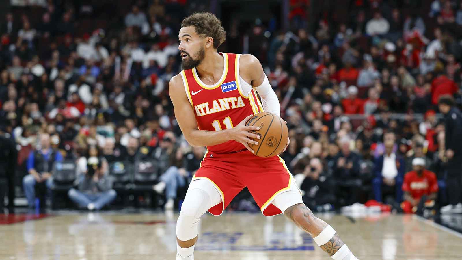 Former Atlanta Hawks guard Trae Young (11) looks to pass the ball against the Chicago Bulls during the second half at United Center.
