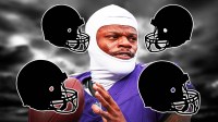 Lamar Jackson in the middle, 4 mystery NFL helmets around him, Dark clouds in the background