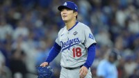 Los Angeles Dodgers pitcher Yoshinobu Yamamoto (18) reacts in the sixth inning against the Toronto Blue Jays during game six of the 2025 MLB World Series at Rogers Centre.