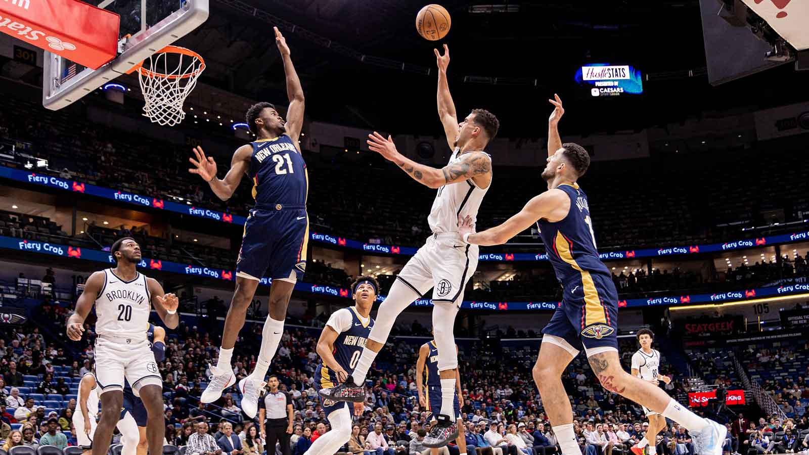 Brooklyn Nets forward Ziaire Williams (1) shoots a jump shot against New Orleans Pelicans center Yves Missi (21) during the first half at Smoothie King Center.