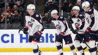 Columbus Blue Jackets defenseman Zach Werenski (8) skates back to the bench after scoring a goal during the third period against the Anaheim Ducks at Honda Center.