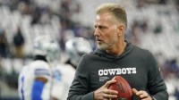 Dallas Cowboys defensive coordinator Matt Eberflus looks on during warmups before the game against the New York Giants at AT&T Stadium.