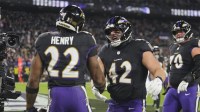 Baltimore Ravens fullback Patrick Ricard (42) congratulates running back Derrick Henry (22) on a touchdown run against the New England Patriots during the first quarter at M&T Bank Stadium.