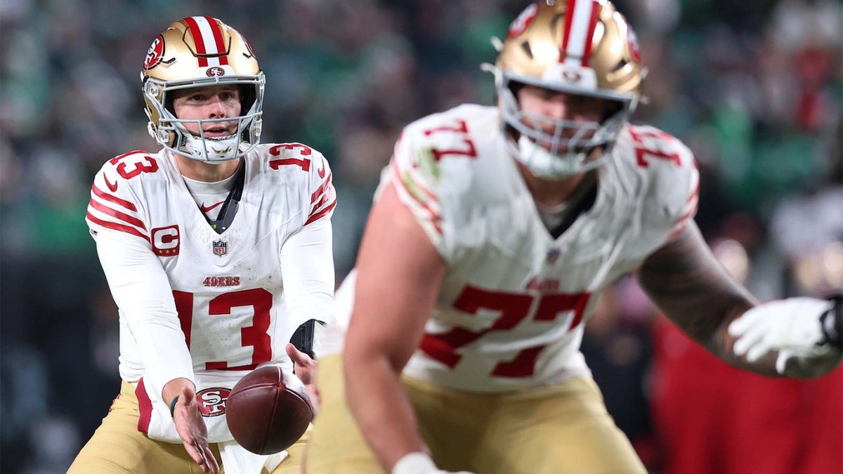 San Francisco 49ers quarterback Brock Purdy (13) catches a snap against the Philadelphia Eagles during the fourth quarter in an NFC Wild Card Round game at Lincoln Financial Field.