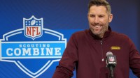 Washington Commanders general manager Adam Peters speaks during the NFL Scouting Combine at the Indiana Convention Center.