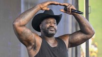 Shaquille O'Neal, also known as DJ Diesel, performs before the 2025 Cotton Bowl and quarterfinal game of the College Football Playoff at AT&T Stadium.