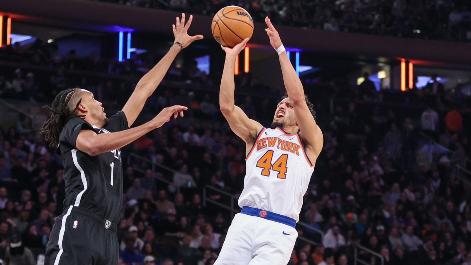 Jan 21, 2026; New York, New York, USA; New York Knicks guard Landry Shamet (44) shoots over Brooklyn Nets forward Ziaire Williams (1) in the second quarter at Madison Square Garden. Mandatory Credit: Wendell Cruz-Imagn Images