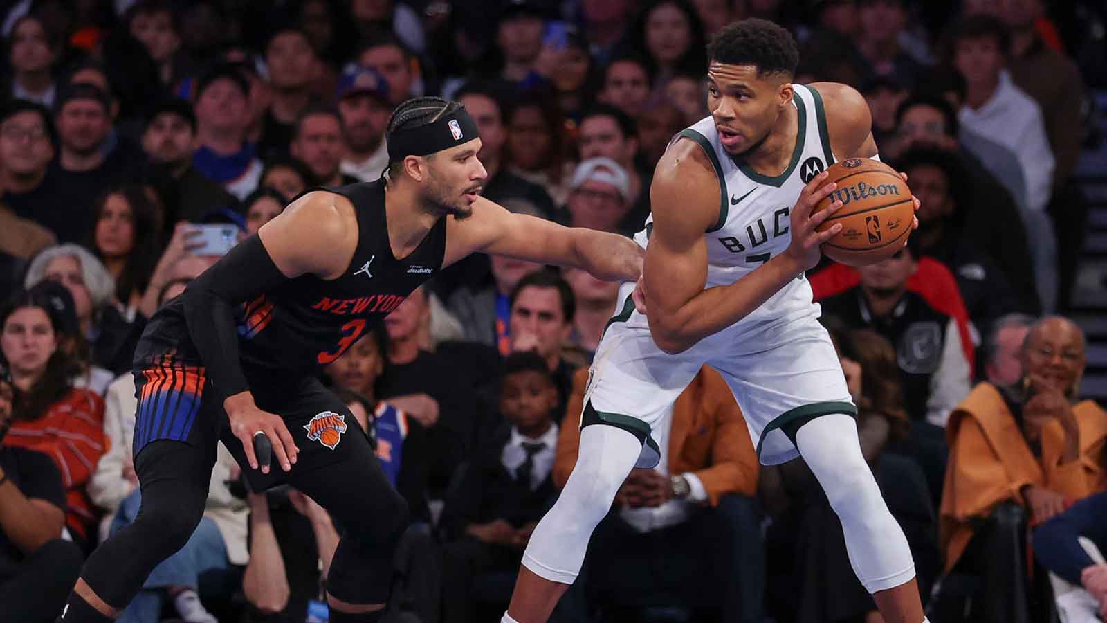 Nov 28, 2025; New York, New York, USA; Milwaukee Bucks forward Giannis Antetokounmpo (34) is guarded by New York Knicks guard Josh Hart (3) during the second half at Madison Square Garden. Mandatory Credit: Vincent Carchietta-Imagn Images
