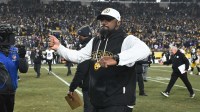 Pittsburgh Steelers head coach Mike Tomlin celebrates after defeating the Baltimore Ravens at Acrisure Stadium