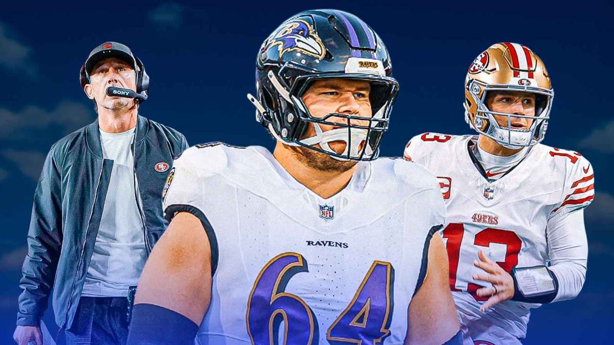 Tyler Linderbaum in the middle, Brock Purdy and coach Kyle Shanahan around him, Blue skies in the background