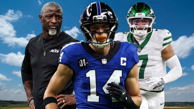 Alec Pierce in the middle, Justin Fields and coach Aaron Glenn around him, Blue skies in the background