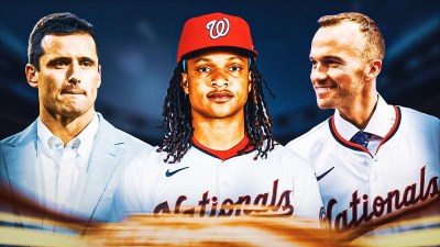 IMAGE: Washington Nationals president of baseball operations Paul Toboni on the right side, Washington Nationals manager Blake Butera on the left side, shortstop CJ Abrams in the center, Nationals Park (home stadium of the Washington Nationals) in the background