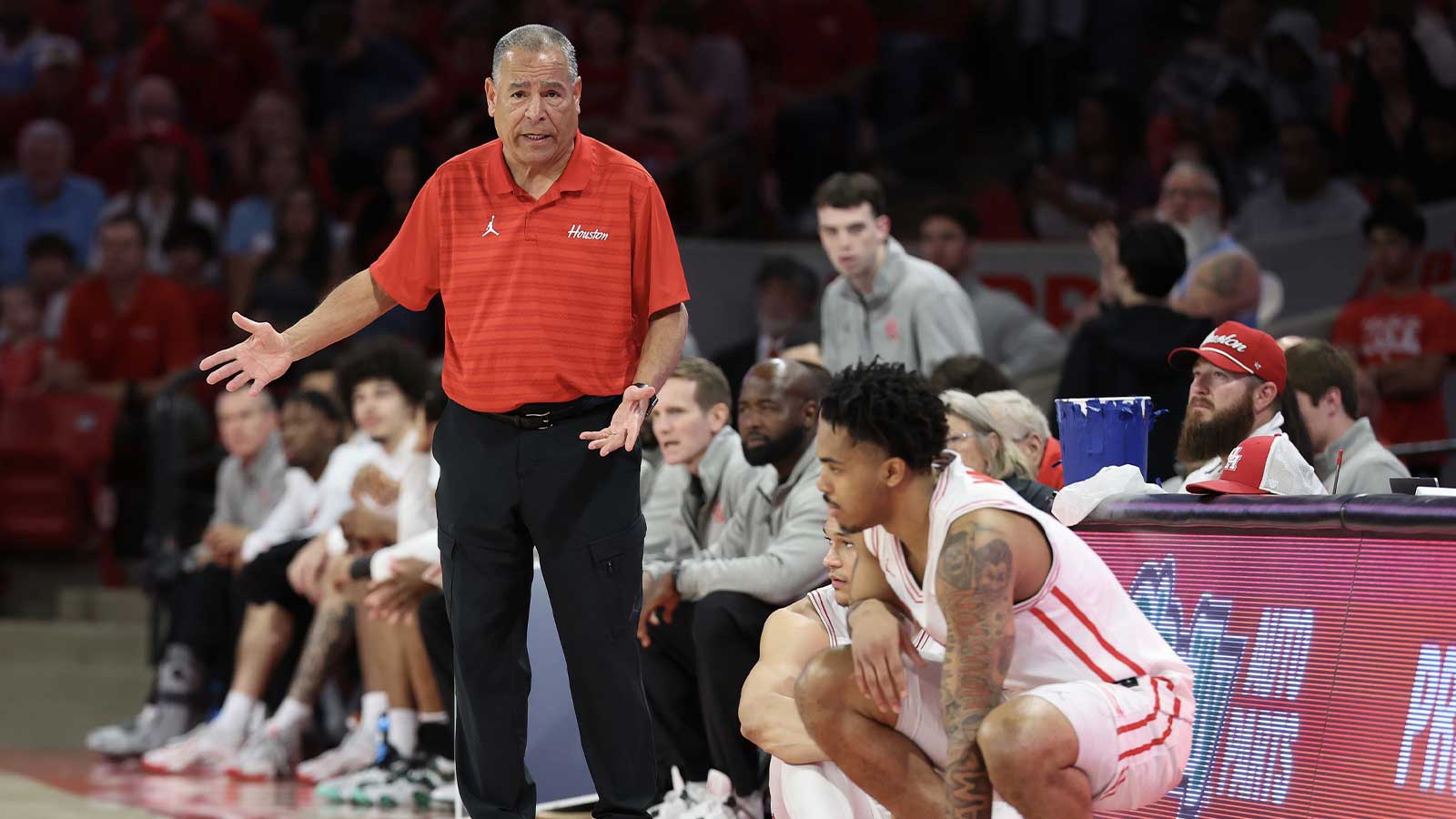 Houston Cougars head coach Kelvin Sampson talks to guard Ramon Walker Jr. (3) as the Cougars play against the Kansas State Wildcats in the first half at Fertitta Center.