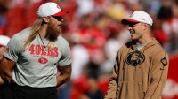 San Francisco 49ers tight end George Kittle (85), left, and running back Christian McCaffrey (23) before a game against the Los Angeles Chargers at Levi's Stadium. Mandatory Credit: Sergio Estrada-Imagn Images