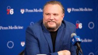 76ers resident of Basketball Operations Daryl Morey speaks with the media before a game against the Detroit Pistons at Wells Fargo Center with Thunder's Jared McCain in the background