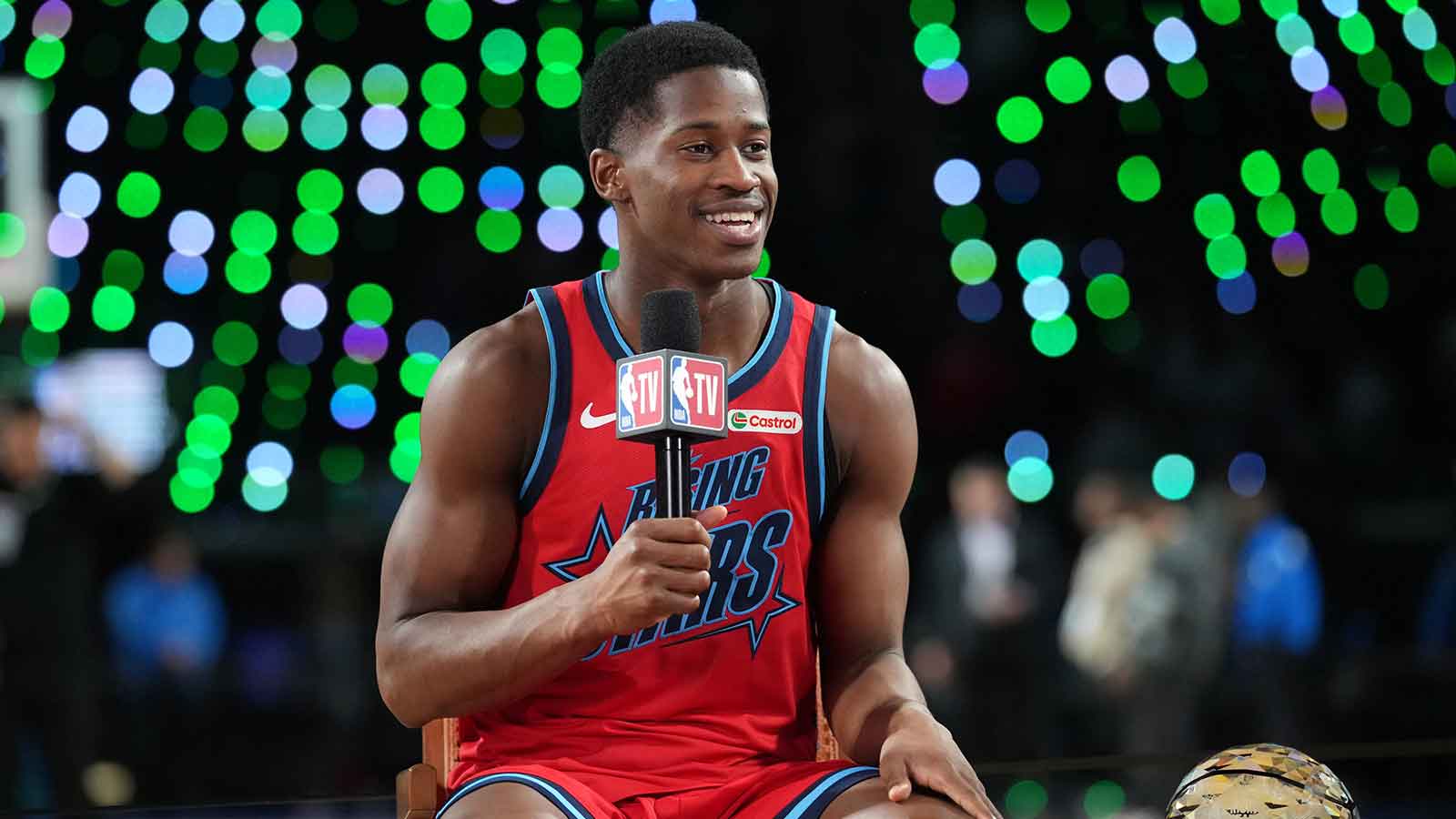 VJ Edgecombe (77) of the Philadelphia 76ers speaks to media after an NBA All Star Rising Stars championship game at Intuit Dome