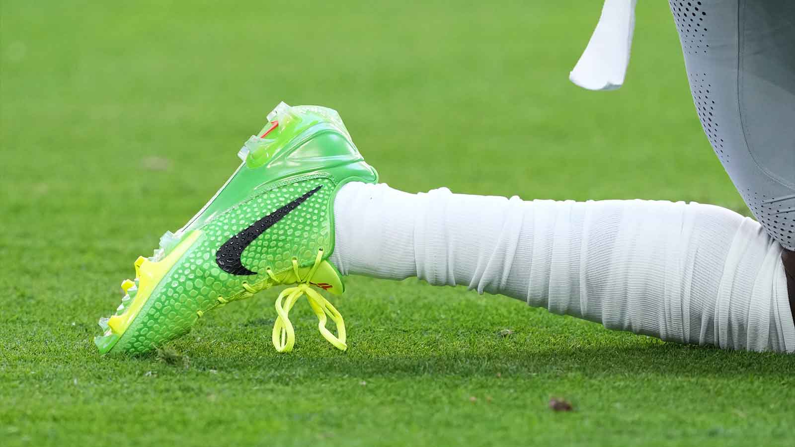 A view of the Nike Vapor Edge Kobe 6 SE Grinch cleats before the game between the Arizona Cardinals and the Seattle Seahawks