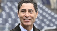 San Diego Padres general manager A.J. Preller looks on before an Opening Day baseball game between the San Diego Padres and the Atlanta Braves at Petco Park.