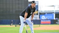 New York Yankees outfielder Aaron Judge (99) watches batting practice during spring training at George M. Steinbrenner Field.