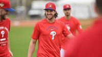 Philadelphia Phillies pitcher Aaron Nola (27) warms up during spring training at BareCare Ballpark.