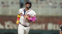 Atlanta Braves right fielder Ronald Acuna Jr (13) reacts after hitting a home run against the Washington Nationals during the sixth inning at Truist Park.
