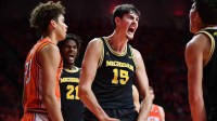 Michigan Wolverines center Aday Mara (15) reacts after scoring during the second half against the Illinois Fighting Illini at State Farm Center.