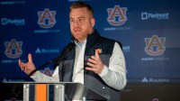 Auburn Tigers football head coach Alex Golesh speaks during a press conference at Woltosz Performance Center in Auburn, Ala. on Monday, Dec. 8, 2025.
